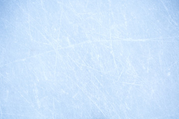 texture of ice on the rink with skating traces 