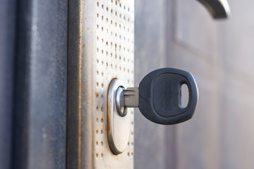 The key in the door lock close-up.