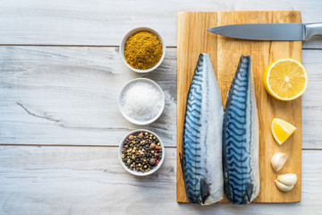Fresh raw mackerel fish with cooking ingridients