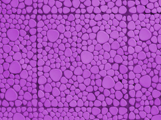 Purple mosaic wall abstract background, close-up.