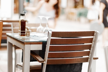 Chairs and tables on a patio in restaurant.