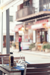 Chairs and tables on a patio in restaurant.