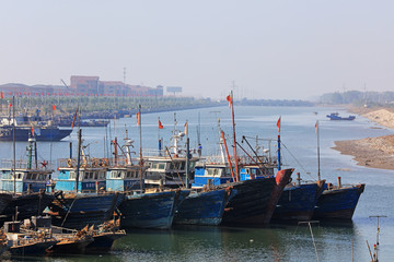 Fishing boats moored at fishing port wharf, Luannan County, Hebei Province, China