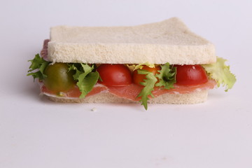 Spanish serrano ham sandwich with tomato and lettuce