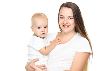 Young mother with baby boy isolated on white background