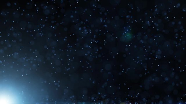 A computer generated animation of blurry dots falling down slowly on a dark, shiny background.