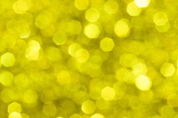 Obraz premium Golden glitter festive background with bokeh lights. Celebration concept for New Year, Christmas Holidays.