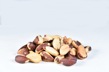 delicious and nutritious Brazilian chestnut, peeled Brazil nut isolated on white background