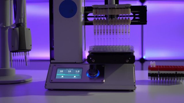 Workbench in microbiological lab with PCR machine