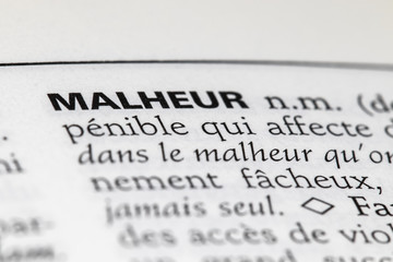 Fototapeta premium Définition du mot malheur dans le dictionnaire français