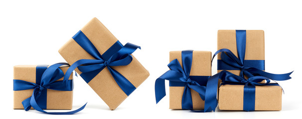 rectangle box wrapped in brown kraft paper and tied with a silk blue ribbon