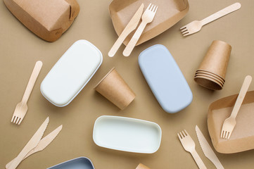 Brown kraft paper food containers on beige background