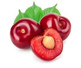 cherry and half with leaves closeup isolated on white background,