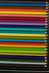Wooden colored pencils of different colors