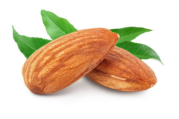 Almonds nuts with leaf isolated on white background with clipping path and full depth of field.