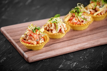 Tasty hearty appetizers with meat and vegetables and microgreen. Concept of food, restaurant, catering