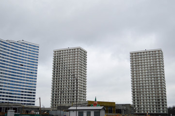 New large modern tall multi-storey comfortable urban monolithic-frame panel houses buildings skyscrapers new buildings in the big city megalopolis