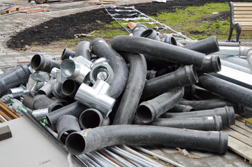 Large black plastic sewer plumbing pipes for the construction of water pipes or sewers at a...