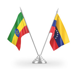 Venezuela and Ethiopia table flags isolated on white 3D rendering