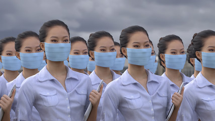 group of asian women in protective masks