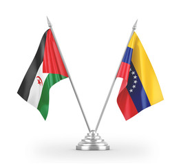 Venezuela and Western Sahara table flags isolated on white 3D rendering