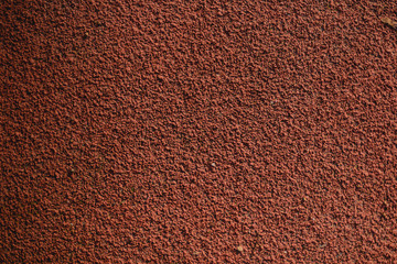 Red wall texture background. Outdoor sports. Colorful sports court background. Top view to red...