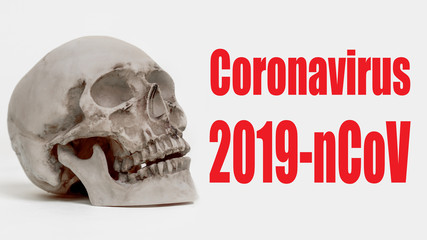 Coronavirus. 2019-nCoV. Human skull. Coronavirus fever in China. Epidemic 2019 in the People's Republic of China. Human skull next to the name of the virus. Healthcare Concept - Chinese Fever Spread