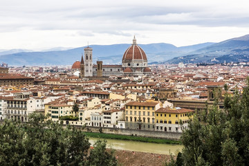 Fototapeta na wymiar Florence winter cityscape. Low season in Italy. Old town duomo view point travel background.