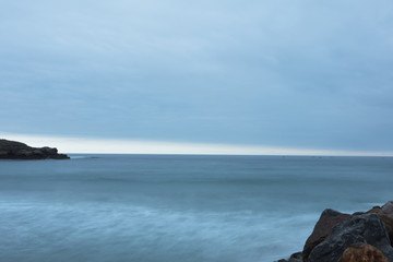 Long exposure photo of a lighthouse on the Spanish coast
