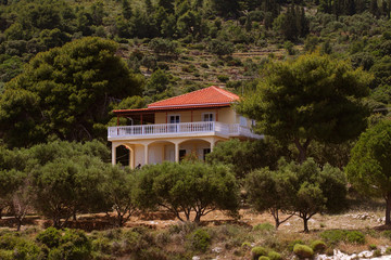 Fototapeta na wymiar House standing on the seashore, Blue caves on Zakynthos island