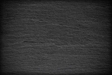 Dark grey black slate background or texture.