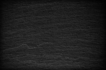 Dark grey black slate background or texture.