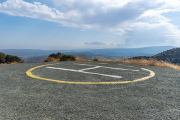 Landing helipad high in the mountains.