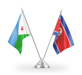 North Korea and Djibouti table flags isolated on white 3D rendering