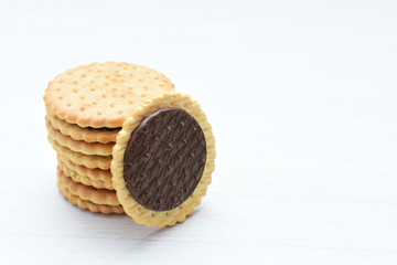  Chocolate cookies displayed on light background