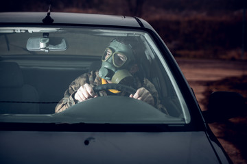 driving a car wearing gas mask