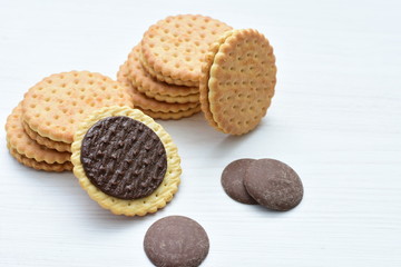  Chocolate cookies displayed on light background