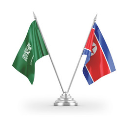 North Korea and Saudi Arabia table flags isolated on white 3D rendering