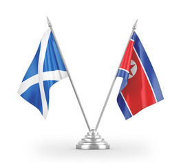 North Korea and Scotland table flags isolated on white 3D rendering