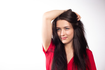 Naklejka premium Business young beautiful lady on a white background shows different emotions copy space