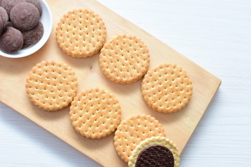  Chocolate cookies displayed on light background