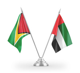 United Arab Emirates and Guyana table flags isolated on white 3D rendering