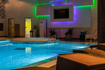 Modern blue on light backdrop. Water - swimming pool. Blue luxurious swimming pool. Swimming pool...