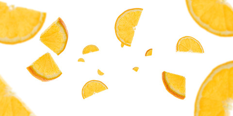 Orange fruit texture background. Citrus fruit tangerine flying on white. Fresh food concept.