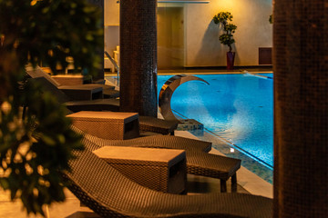 Modern blue on light backdrop. Water - swimming pool. Blue luxurious swimming pool. Swimming pool...