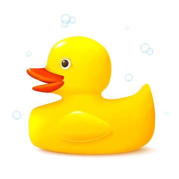 Cute bath toy yellow rubber duck side view.