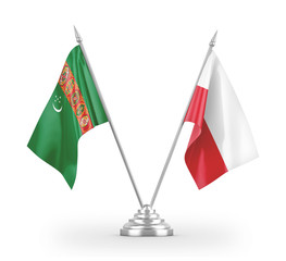 Poland and Turkmenistan table flags isolated on white 3D rendering