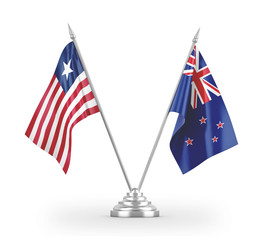 New Zealand and Liberia table flags isolated on white 3D rendering