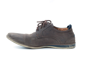 Brown old shoes on a white background