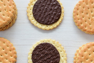 Chocolate cookies displayed on light background